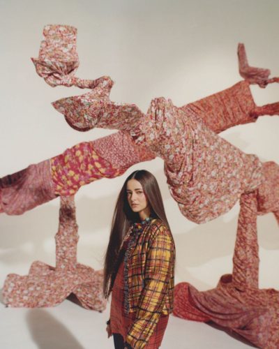 Ananya Panday in vibrant flowing skirt and chic plaid jacket