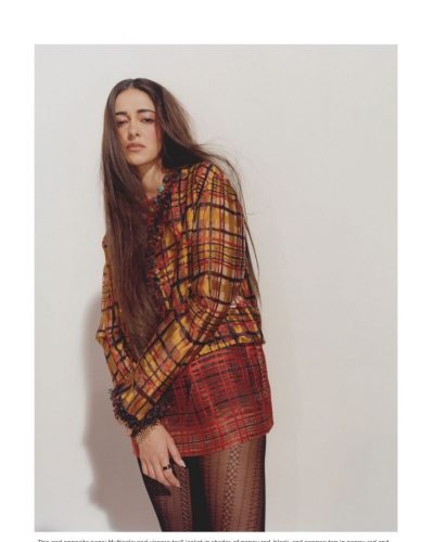 Ananya Panday with colorful statement earrings and plaid jacket