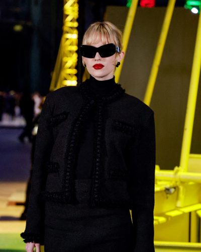 ANGELE wearing tailored black jacket with playful details