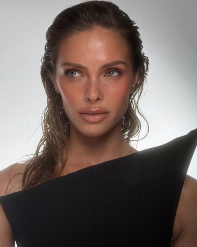 Anna Maria Olbrych in a floral maxi dress with vibrant colors