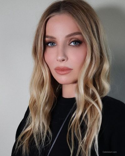 Annabelle Wallis wearing a black casual tee and trendy pants