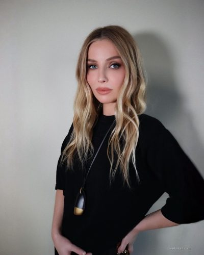 Annabelle Wallis wearing a comfortable black tee and tailored pants