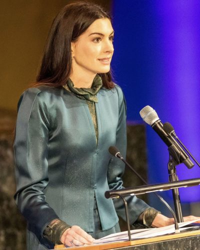 Anne Hathaway contemporary teal dress with a smooth fabric finish