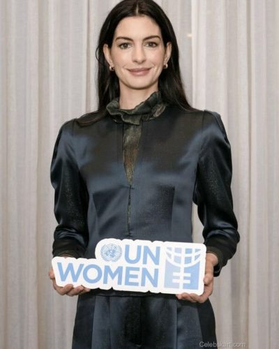 Anne Hathaway fitted teal dress with delicate cuff detailing