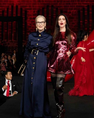 Anne Hathaway shimmering vibrant dress with playful textures