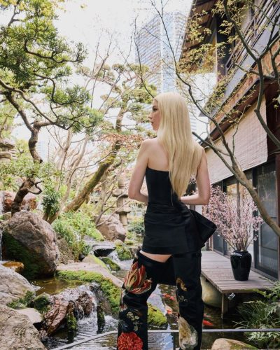 Anya Taylor-Joy chic black gown featuring intricate floral designs