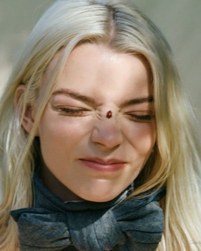 Anya Taylor-Joy chic light dress with cascading hair