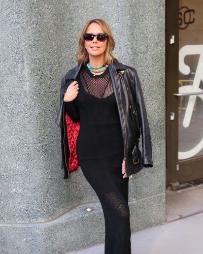 Arielle Kebbel black dress with intricate mesh details in NYC