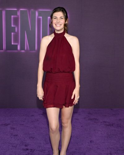 Ava Bunn sophisticated maroon gown with a flowing silhouette