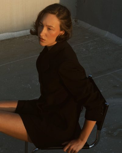 Ava Michelle in floral maxi dress with flowing fabric.