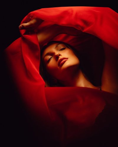 Avamarie Schroeder wearing a black lace jumpsuit with graceful lines