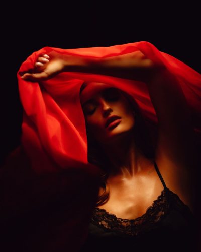 Avamarie Schroeder in elegant black lace jumpsuit