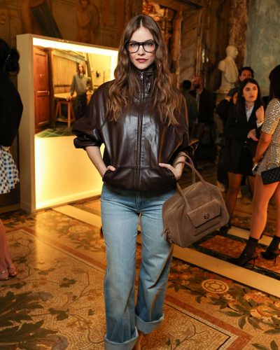 Barbara Palvin brown puffer jacket, blue denim cropped pants, black heels