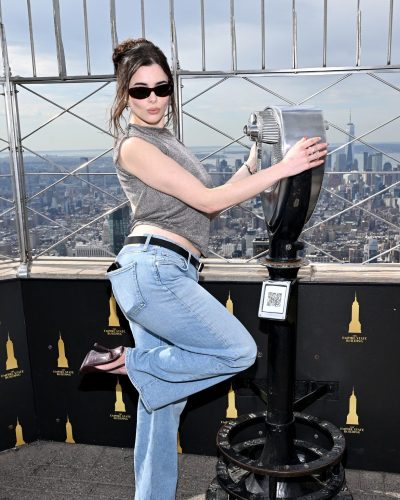 Barbie Ferreira relaxed hairstyle enhancing her fashionable appearance.