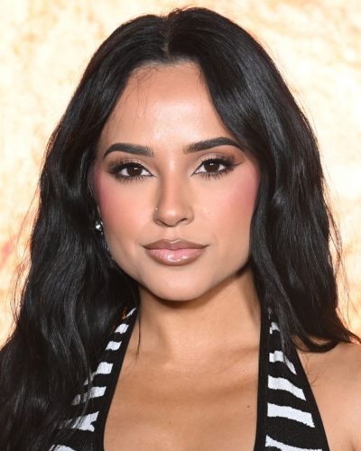 Becky G classic black and white dress with elegant heels