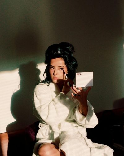 Becky G gray dress with yellow lace detailing