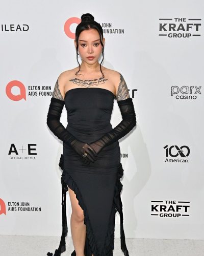 Bella Poarch in black gown with sophisticated accessories