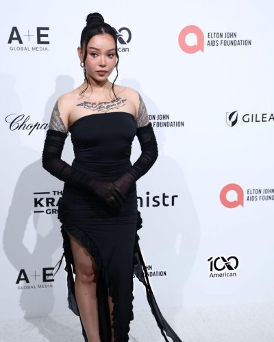 Bella Poarch in black strapless dress with fitted silhouette