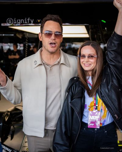 Brie Larson casual black leather jacket with colorful tee