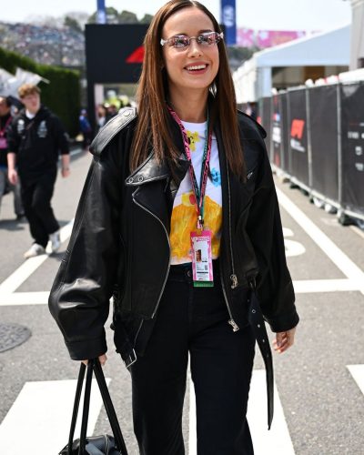 Brie Larson chic black leather jacket with graphic tee