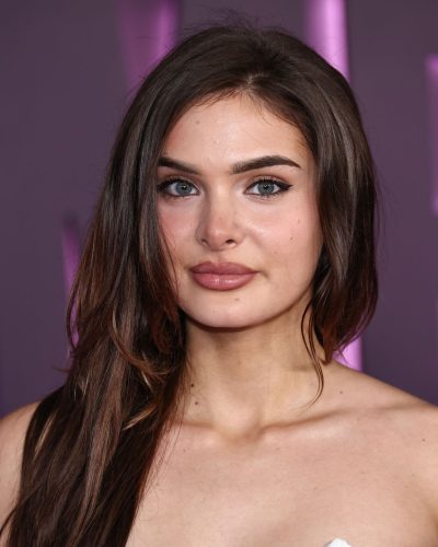 Brighton Sharino white dress complemented by chic handbag