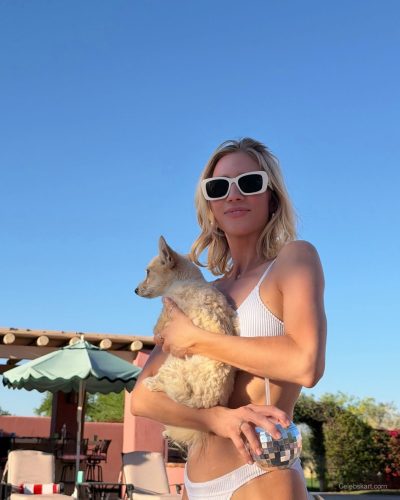 Brittany Snow in a light blue gown with delicate fabric details