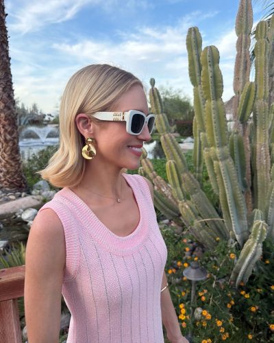 Brittany Snow wearing a beautiful blue gown with a relaxed fit