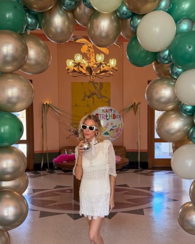 Brittany Snow in a light blue gown with delicate fabric details