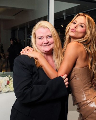 Brooks Nader in neutral-toned dress with shimmering fabric