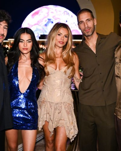 Brooks Nader in neutral color dress perfect for luxury