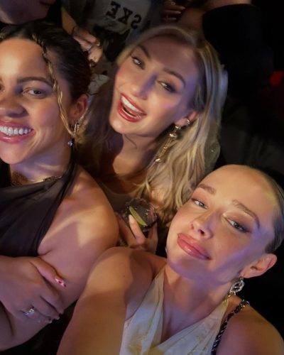 Cameron Brink with a lace top and a shimmering mini skirt.