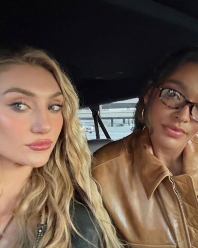 Cameron Brink in yellow halter dress with flowing golden hair.