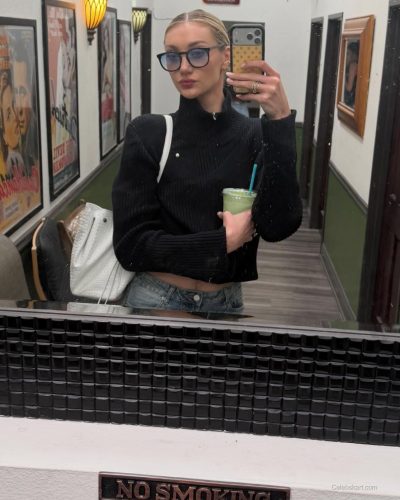 Cameron Brink wearing a vibrant yellow dress and elegant jewelry.