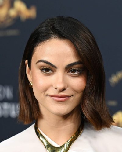 Camila Mendes in white gown at CinemaCon photo