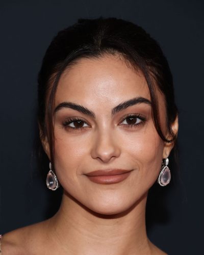 Camila Mendes soft-toned makeup matching her nude dress.