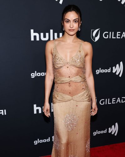 Camila Mendes hair styled in a sleek low ponytail.