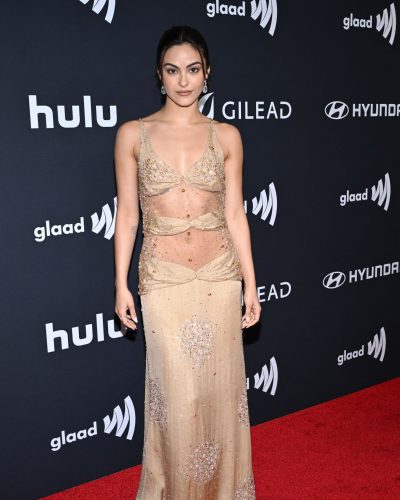 Camila Mendes intricate detailing on her nude dress design.