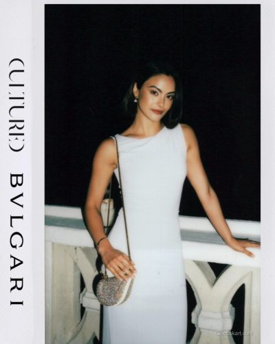 Camila Mendes in light blue dress with chic jewelry