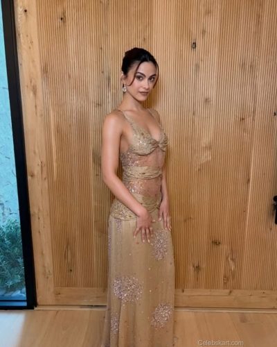 Camila Mendes wearing a sheer dress with sparkling gems