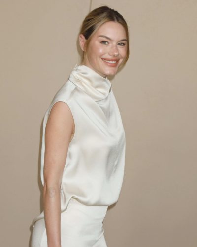 Camille Rowe in white gown at Gala Screening image 5
