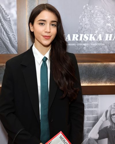 Caylee Cowan in a tailored black blazer and crisp shirt