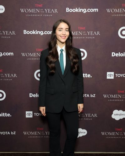 Caylee Cowan wearing a light blue tie with black suit