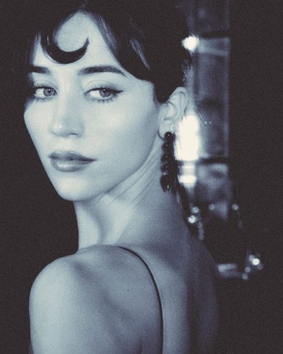 Caylee Cowan in shimmering silver dress reflecting light beautifully.