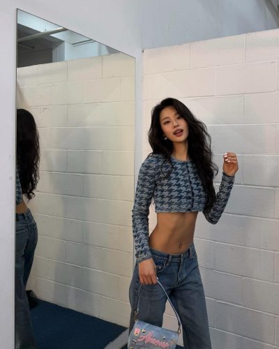 Cece Zhen in fashionable oversized top paired with black shorts