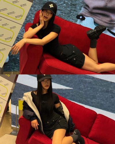 Cece Zhen in relaxed brown top complemented by black shorts