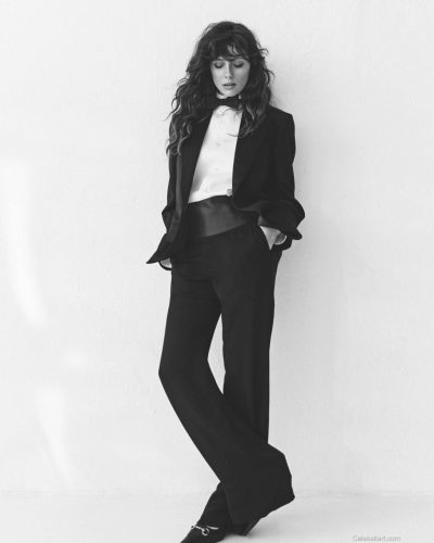 Celeste Dalla Porta in shimmering silver dress with simple earrings