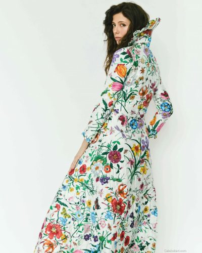 Celeste Dalla Porta in fitted silver dress with reflective sequins