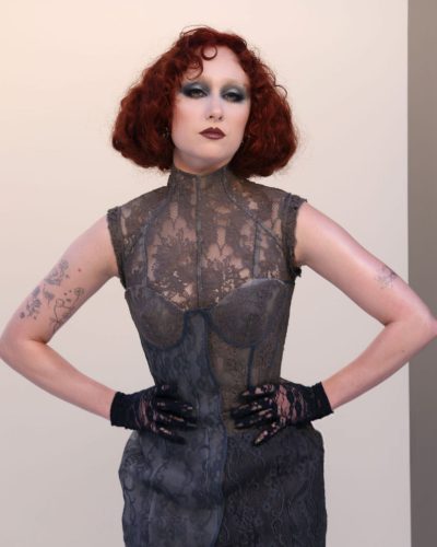 Chappell Roan intricate lace dress featuring layered textures in gray