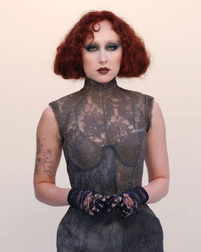 Chappell Roan layered gray dress with unique lace design details