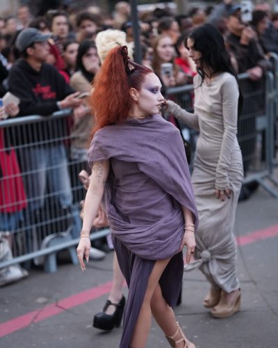 Chappell Roan in lavender gown with a complementary shawl draped